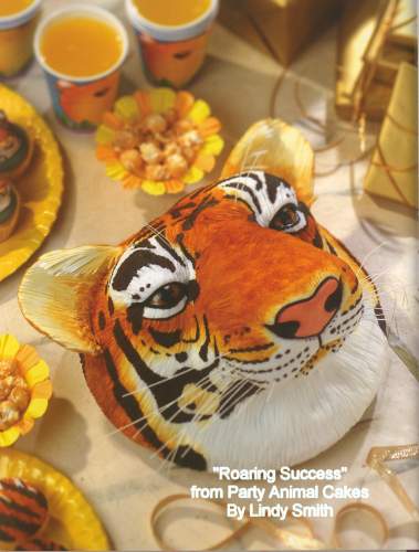 Tigar head cake from Party animal cakes' book by Lindy Smith
