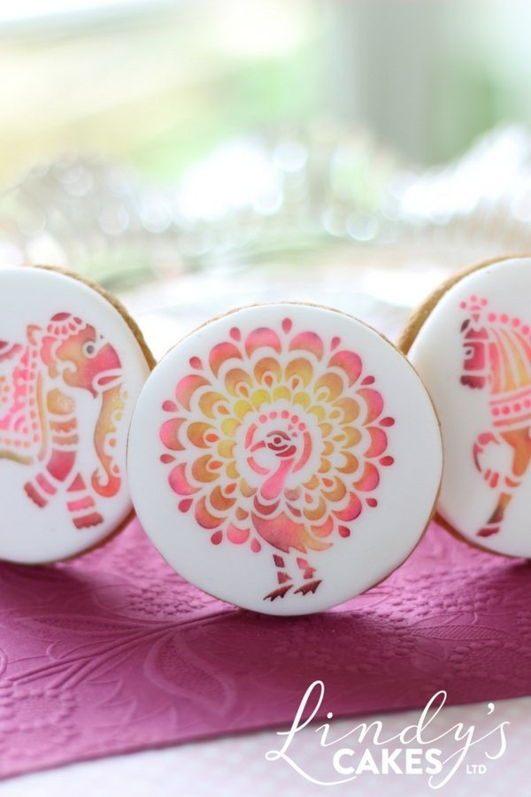 pink peacock decorated cookies by award winning cake decorator and sugarcraft artist Lindy Smith