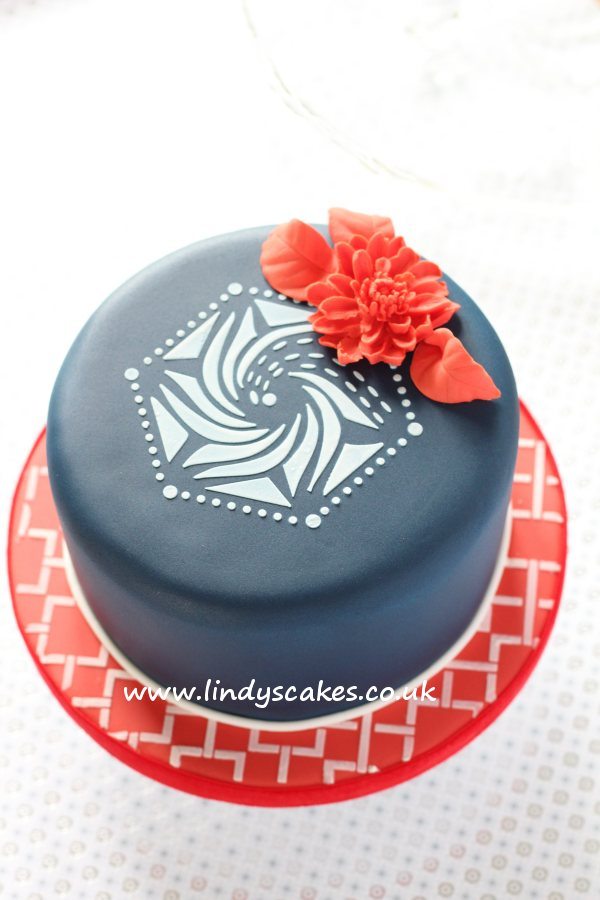 Simple stencilled hexagon cake in red, white and blue