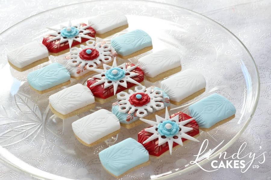 white, red and aqua Christmas cracker cookies by Lindy Smith orginally published in the Cake Masters Magazine