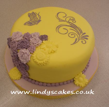 Pretty spring cake - great use of moulds and stencils Rachel!
