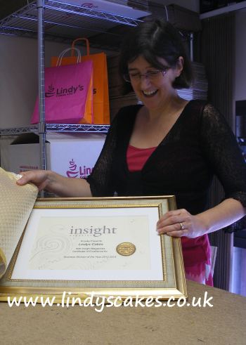 Lindy Smith awarded 'business woman of the year 2012-2013' by Insight Magazine
