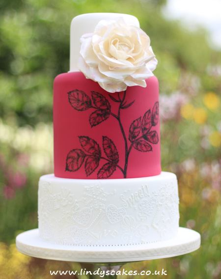 White rose wedding cake by luxury cake designerLindy Smith