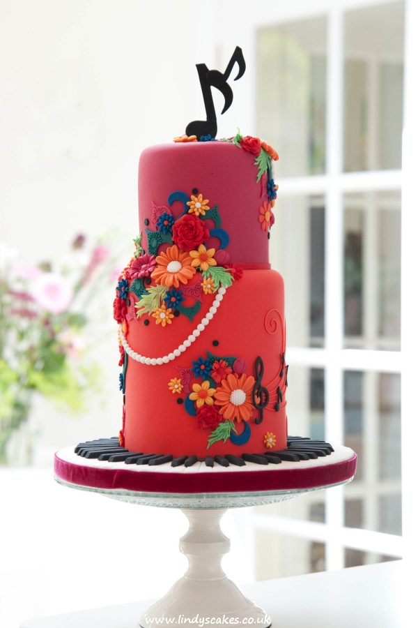 Colour crescendo pink and orange musical themed cake by Lindy Smith