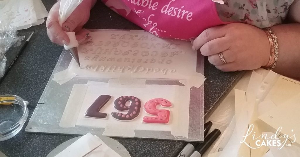 royal icing runouts and lettering