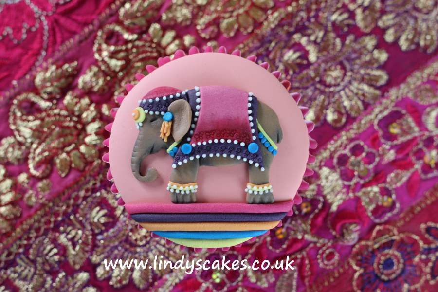 An elephant cupcake but not just any old elephant cupcake a beautifully decorated Asian elephant
