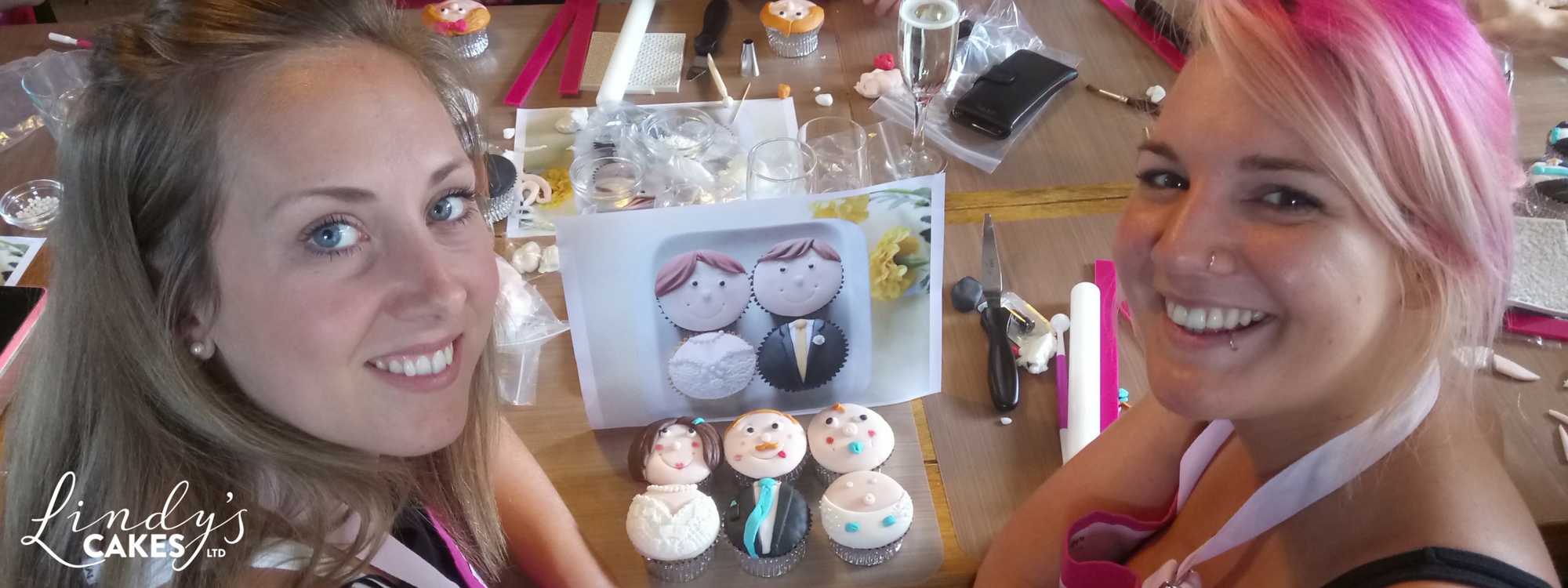 Girls enjoying a bride and groom cupcake hen party run by Lindy Smith