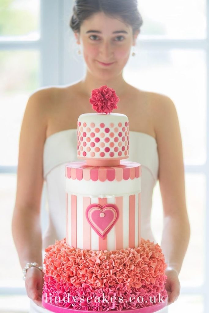 Ombre colour pink and peach ruffle cake from my book 'Simply Modern wedding Cakes'